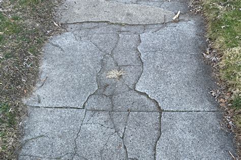 Cracked sidewalk concrete removal North Texas